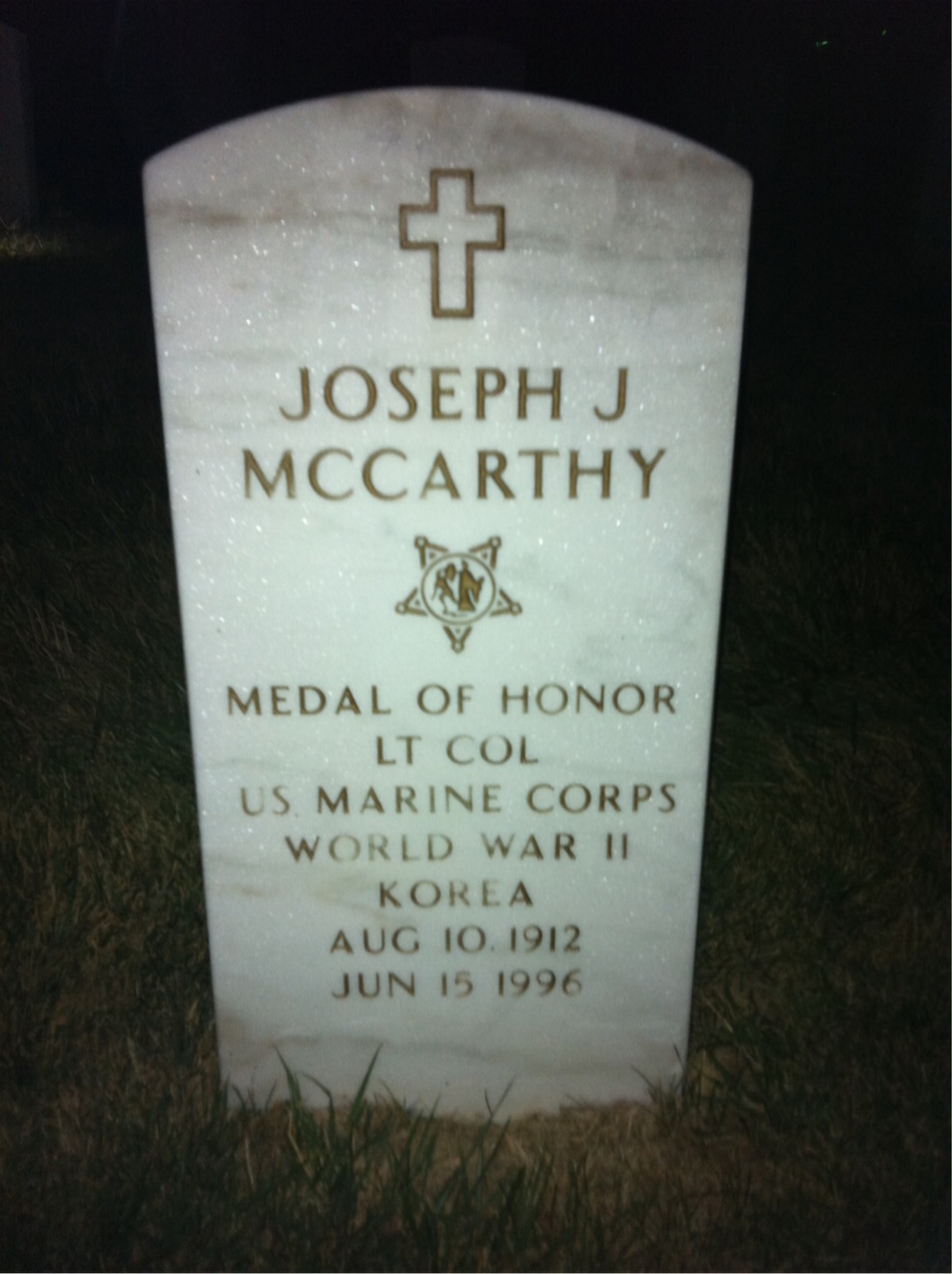 Headstone shared by 2 interments, including Joseph J. McCarthy