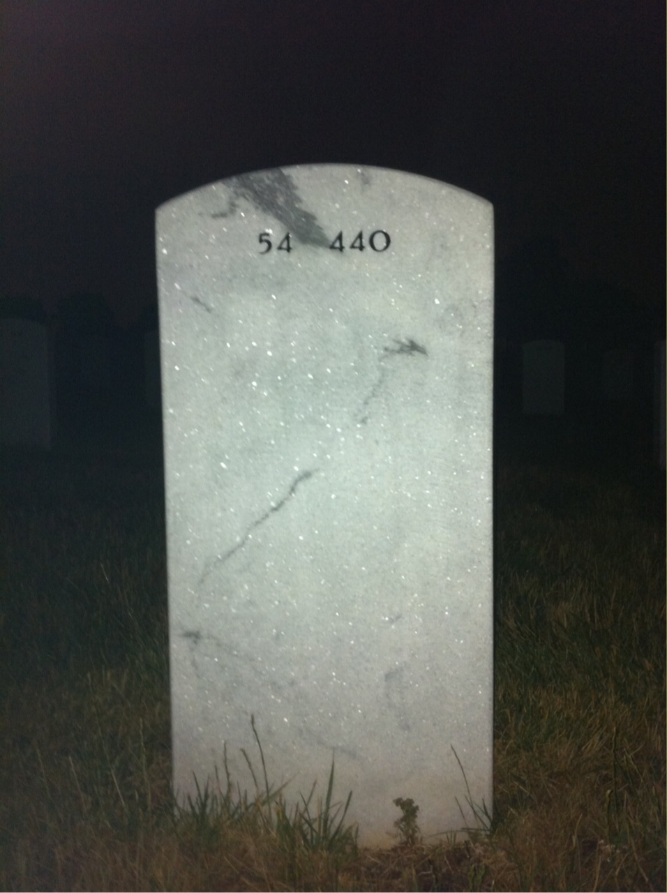 Back of headstone — Rolando Guzman