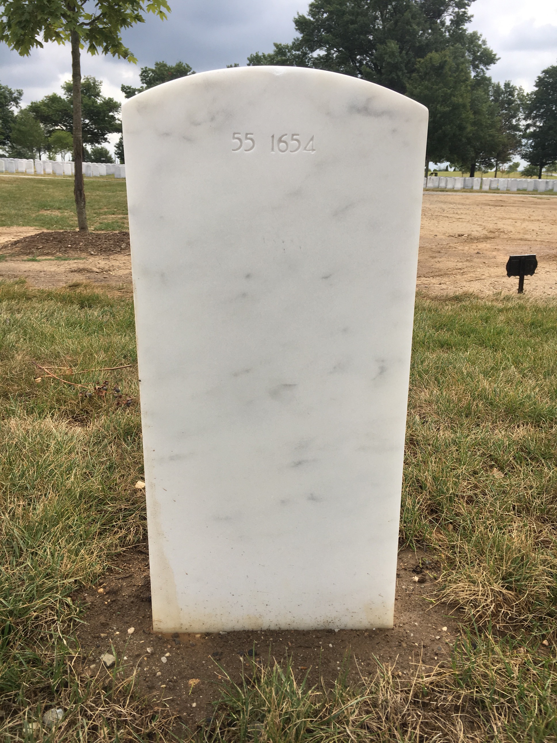 Back of headstone — Jason Brekke