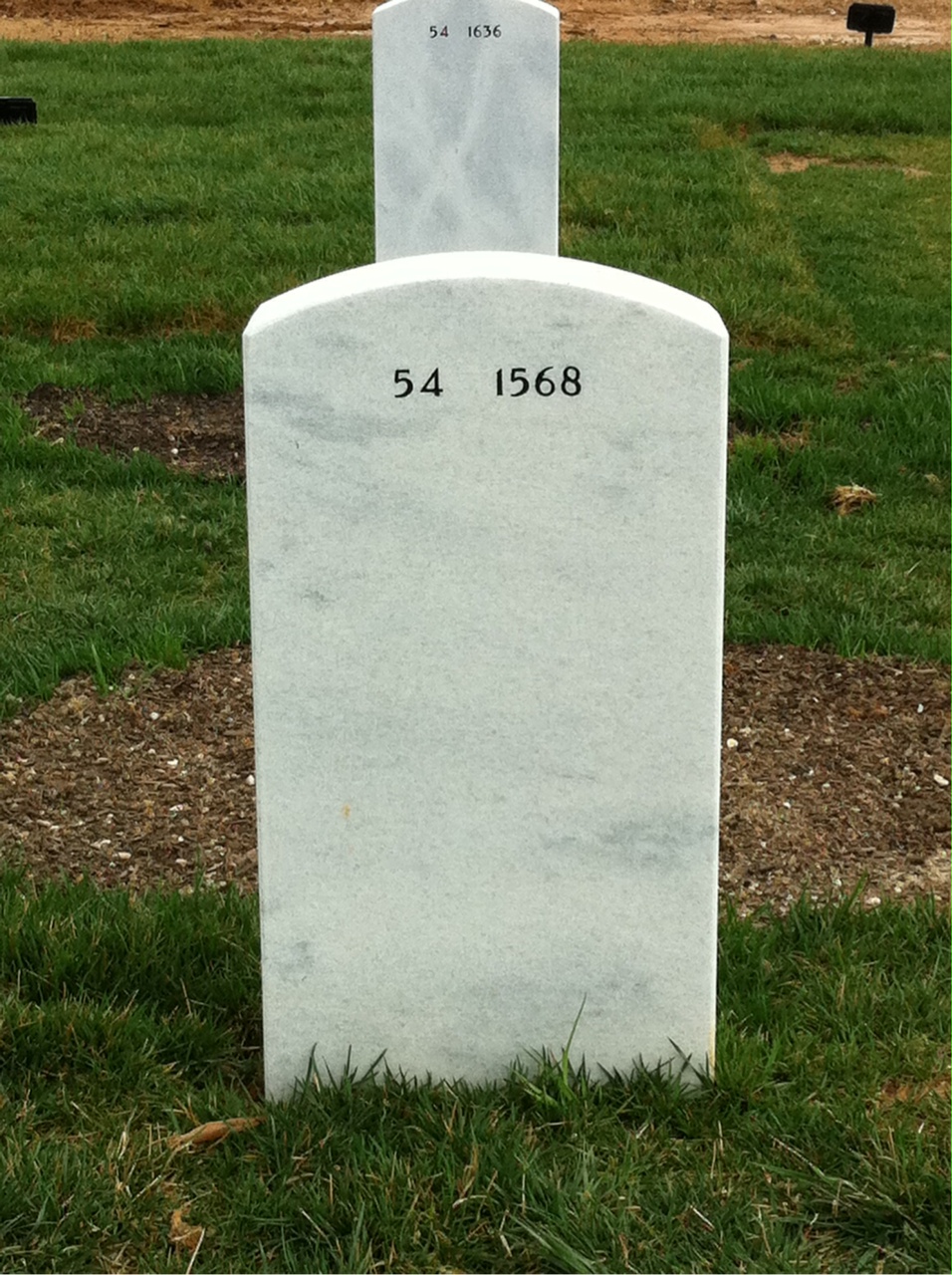 Back of headstone — Isadore Bentivoglio