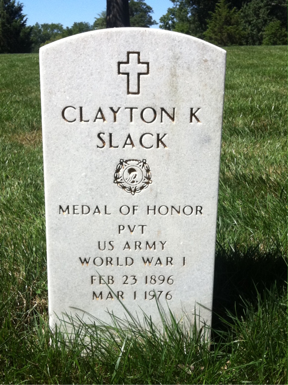 Headstone shared by 2 interments, including Clayton K. Slack