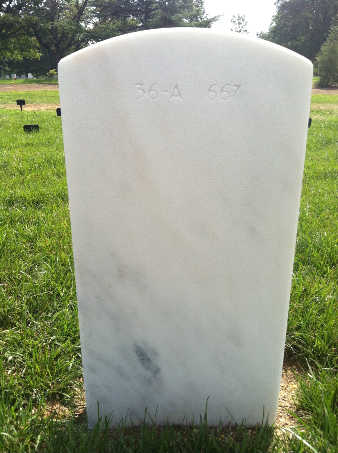 Back of headstone — Frank Meneely