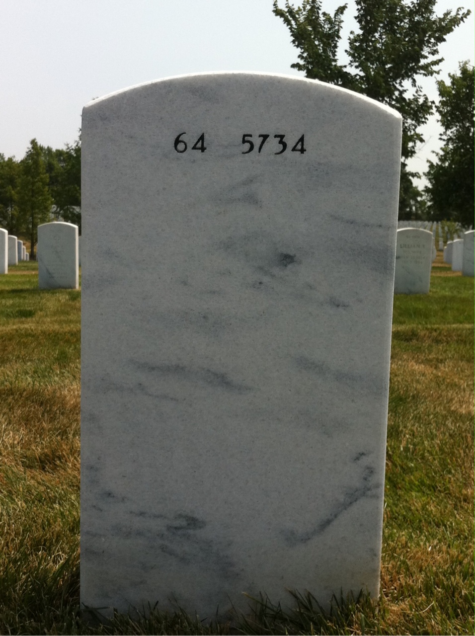 Back of headstone — Carmen Megaro