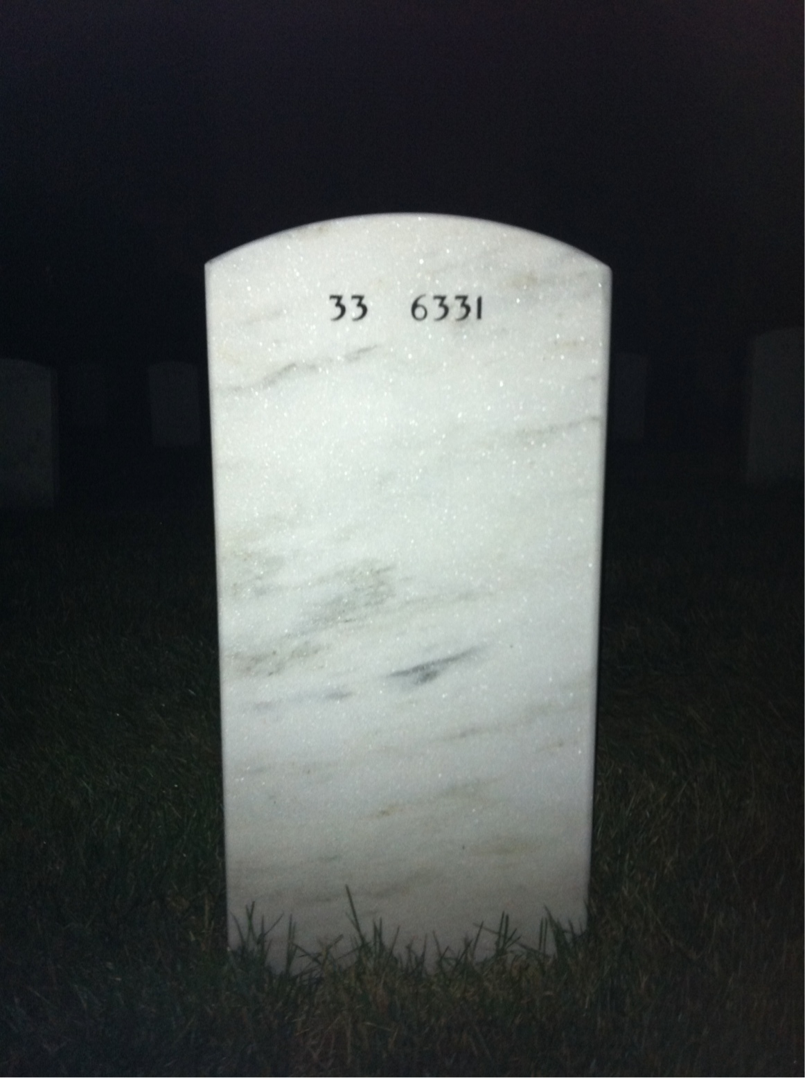 Back of headstone — Lowell Howard