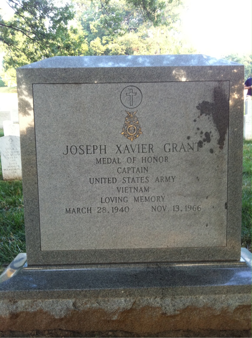 Headstone shared by 2 interments, including Joseph Xavier Grant