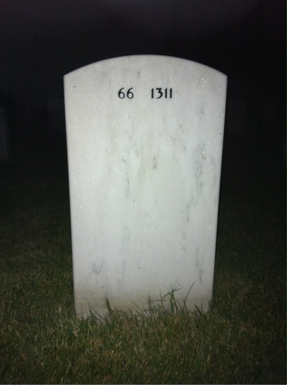 Back of headstone — Lloyd Marcus