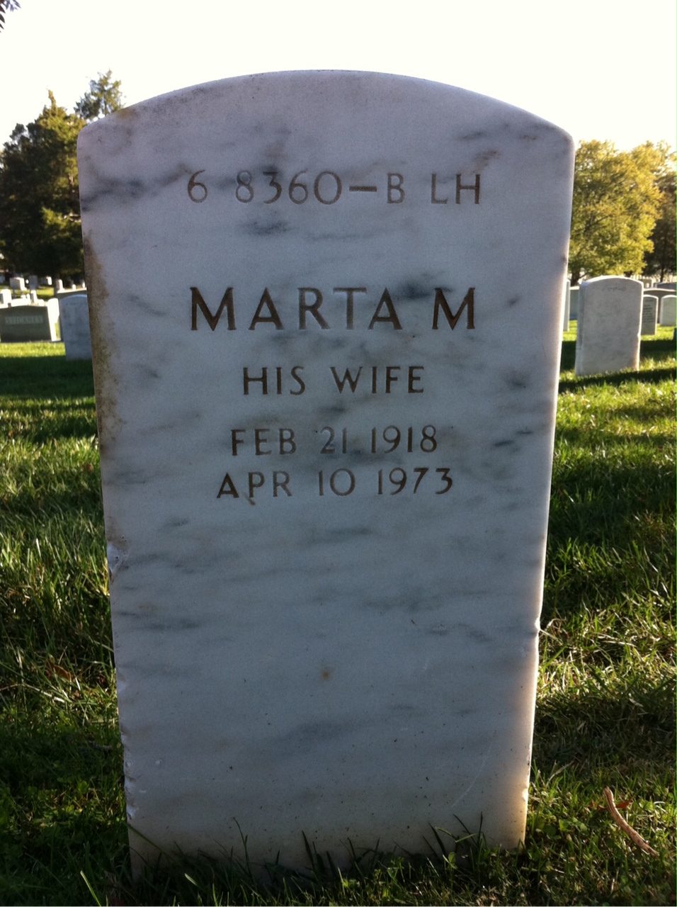 Headstone shared by 2 interments, including Raymond Harvey