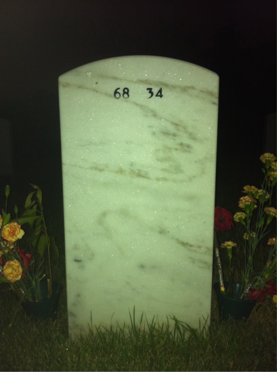 Back of headstone — Carlos Brenes