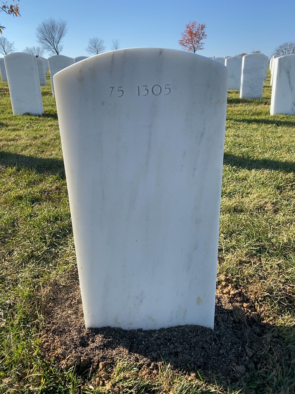 Back of headstone — Gary Baasch