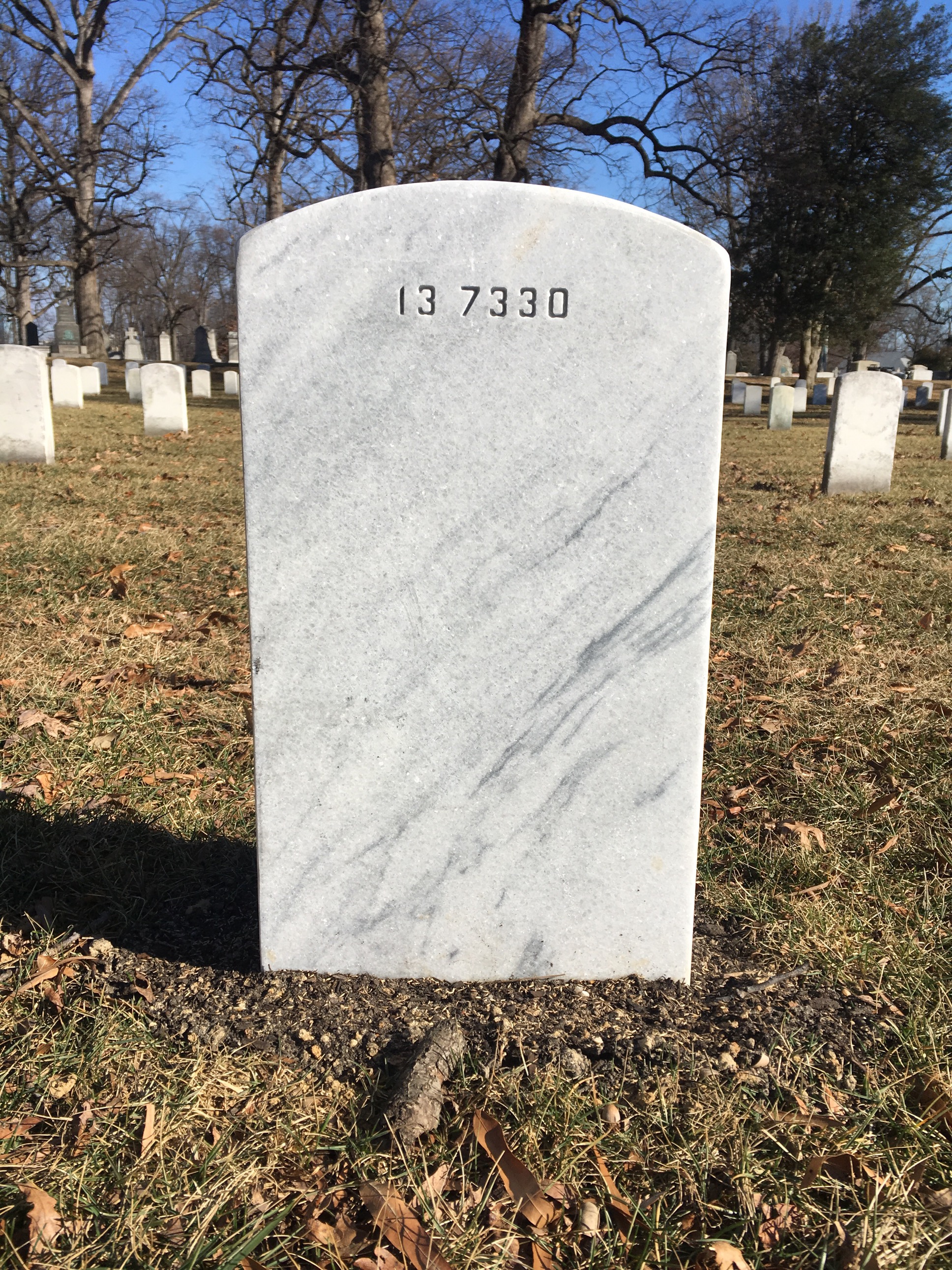 Back of headstone — N B
