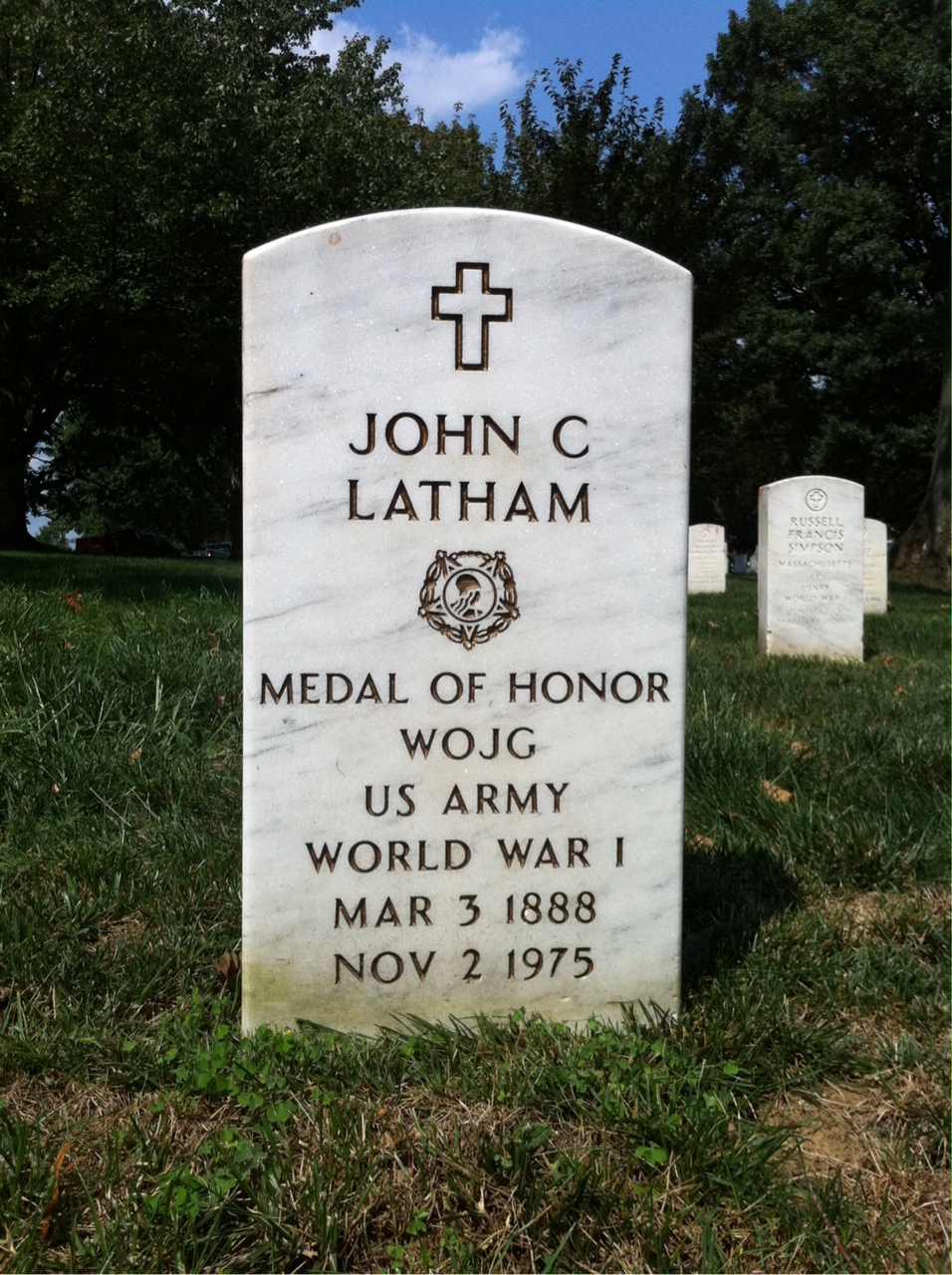 Headstone shared by 2 interments, including John C. Latham