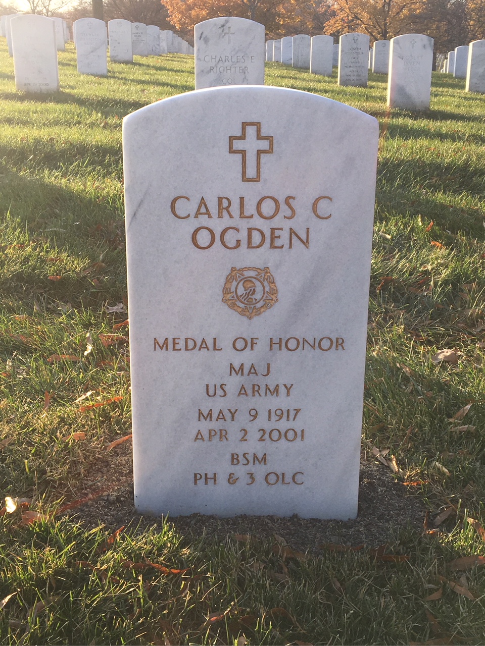 Headstone shared by 2 interments, including Carlos C. Ogden