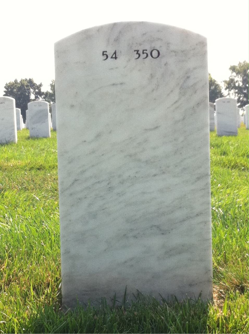 Back of headstone — Ned Martini