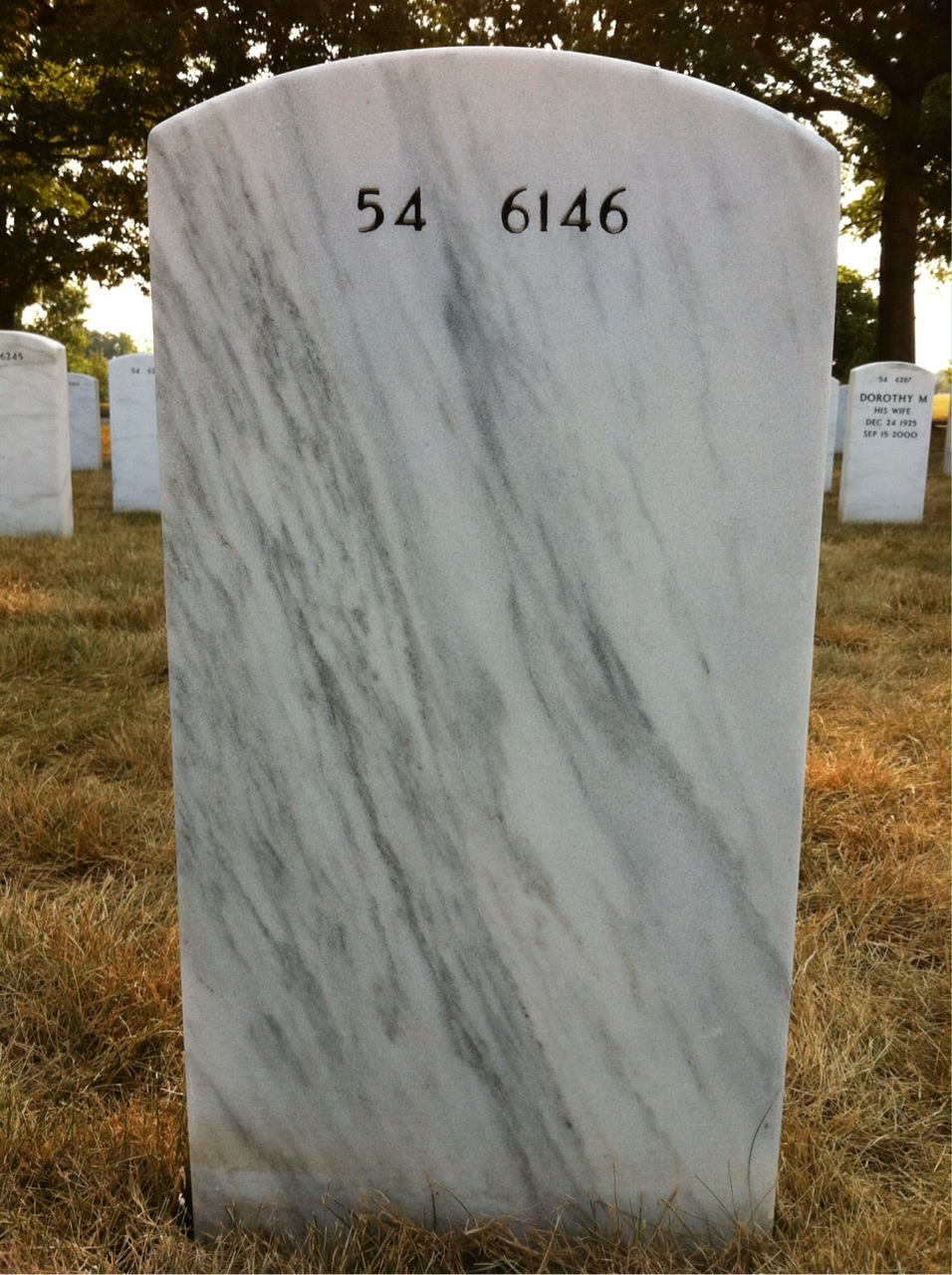Back of headstone — Kim Howard
