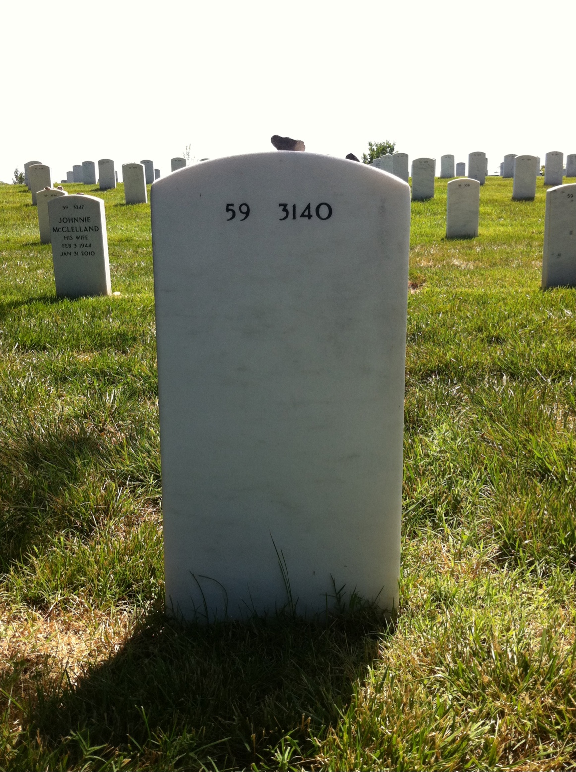 Back of headstone — Dennis Saulnier