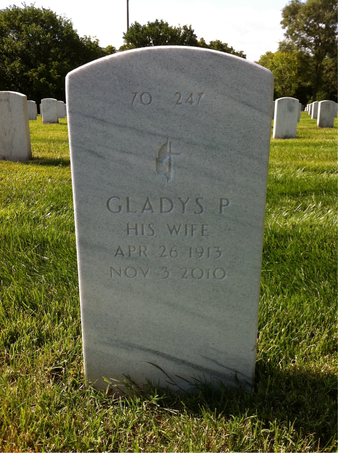 Back of headstone — Roger Atohi