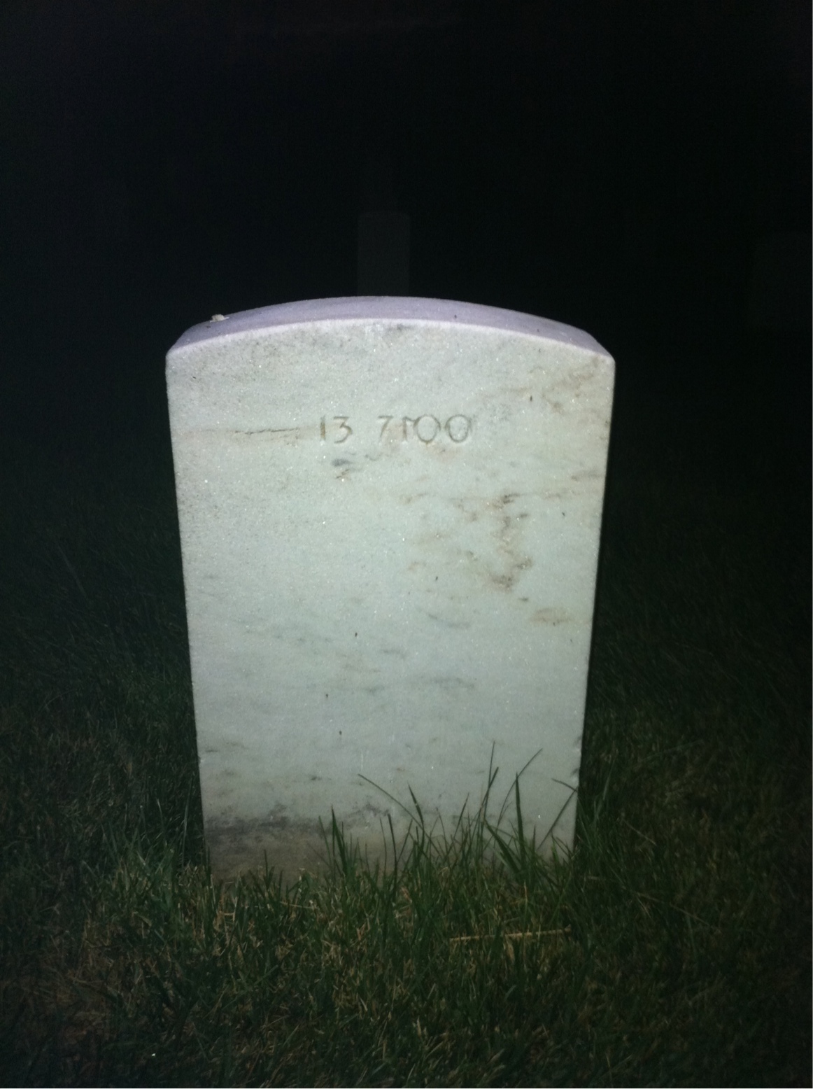 Back of headstone — Eugene Mitchell
