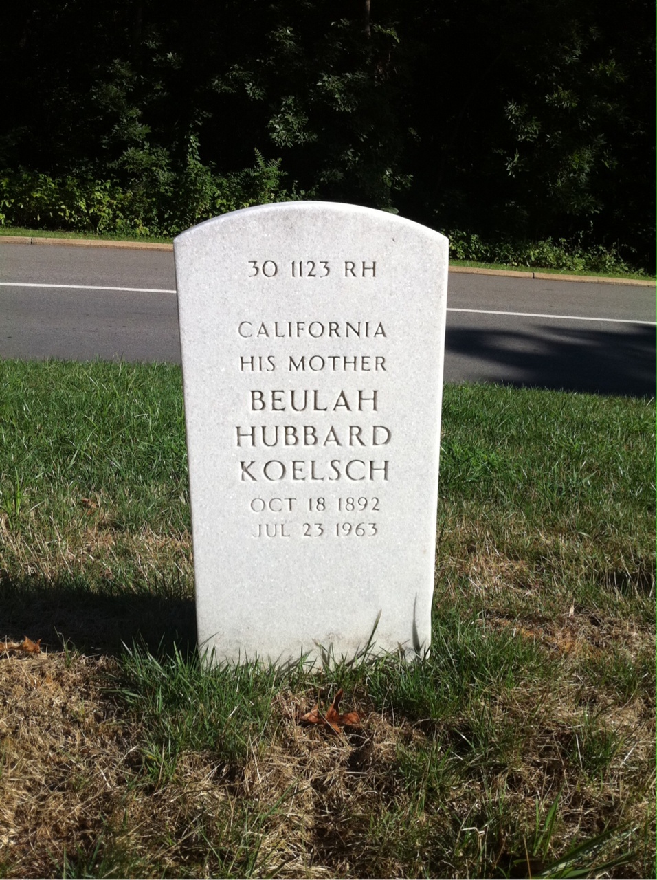 Headstone shared by 2 interments, including John Kelvin Koelsch