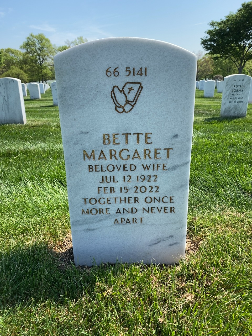 Headstone shared by 2 interments, including John J. Tominac