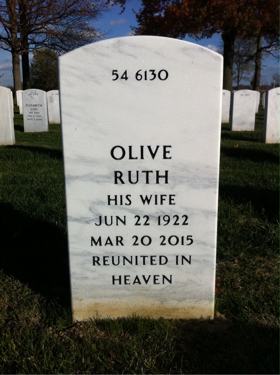 Back of headstone — Elwood Yost