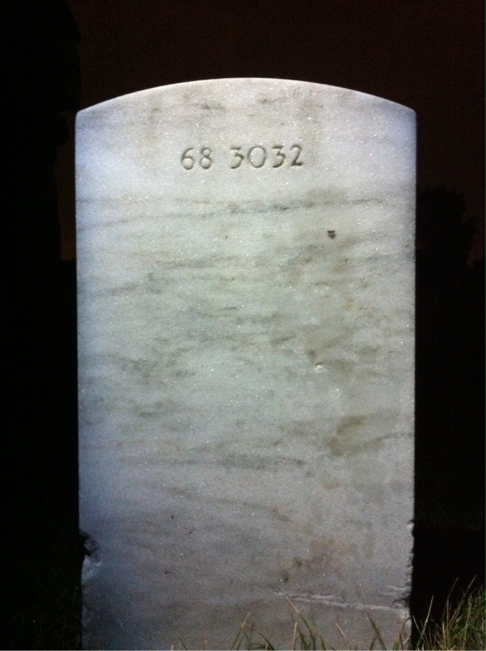 Back of headstone — Oren Carl Tucker