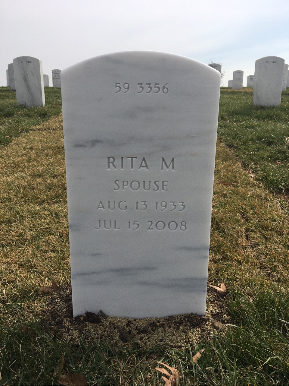 Back of headstone — Dennis Scott