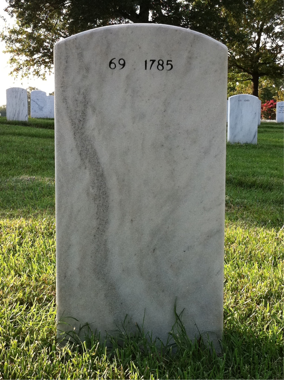 Back of headstone — Raymond Lackore