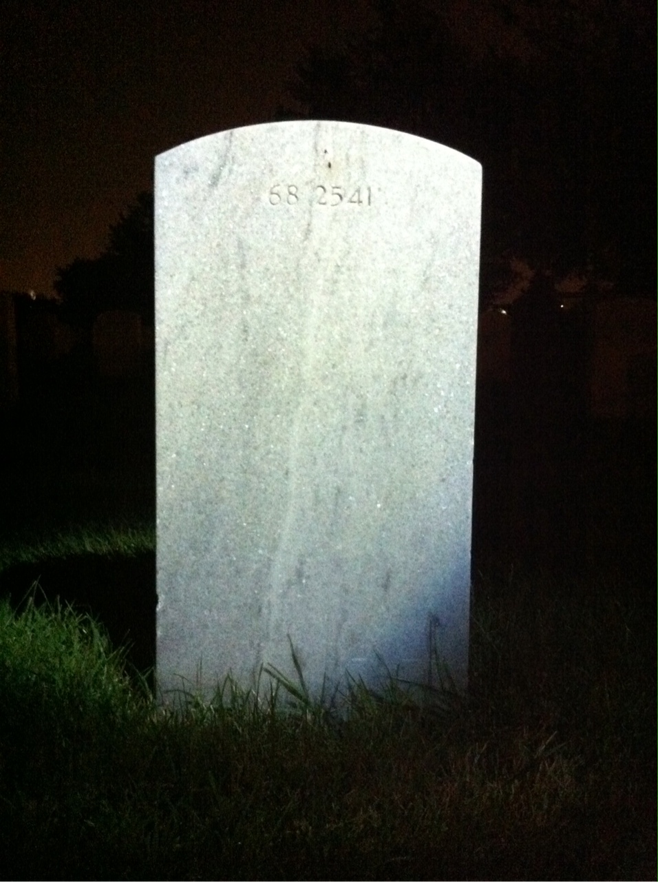Back of headstone — Clyde Moore