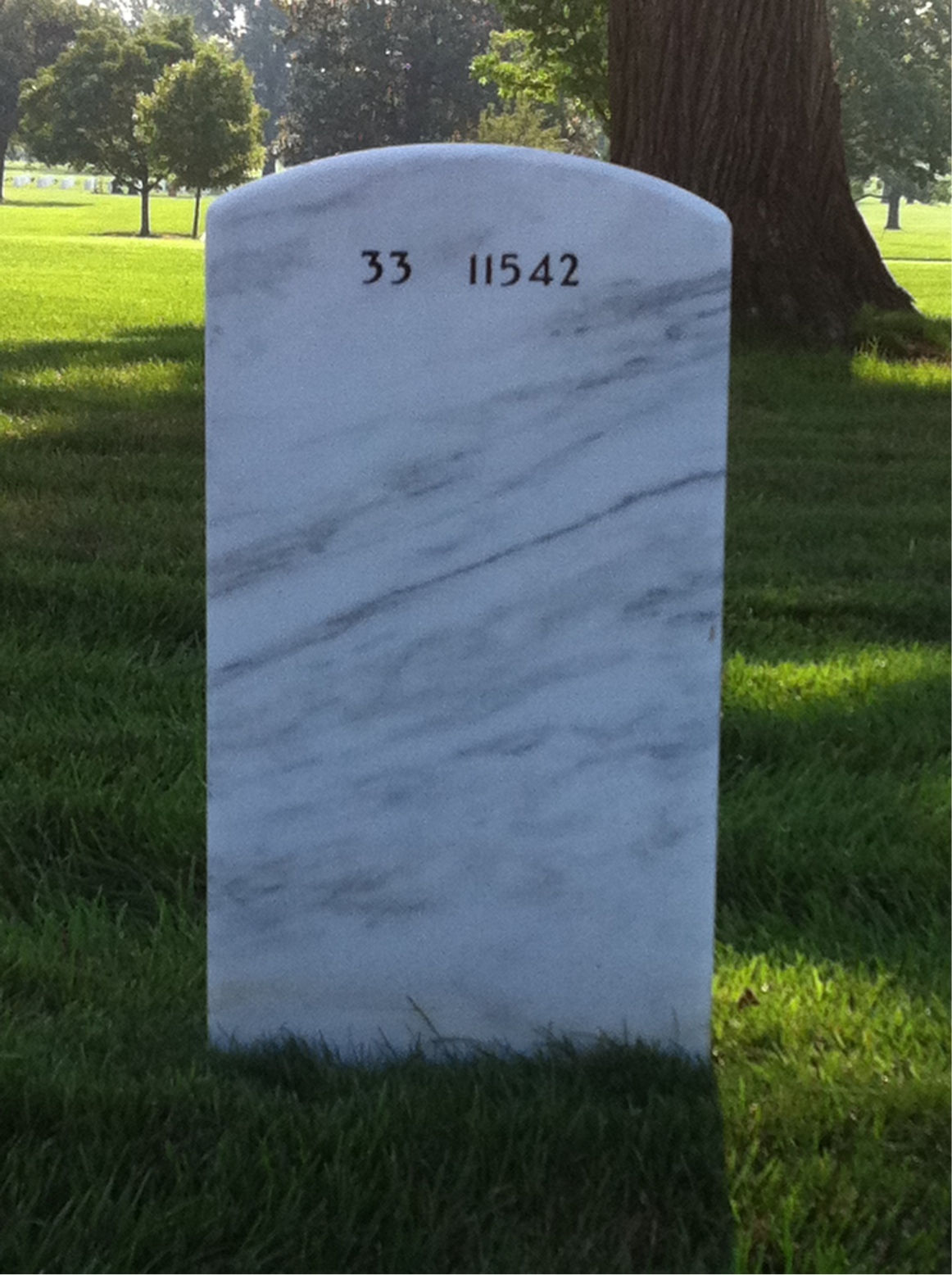 Back of headstone — Rex Wagner