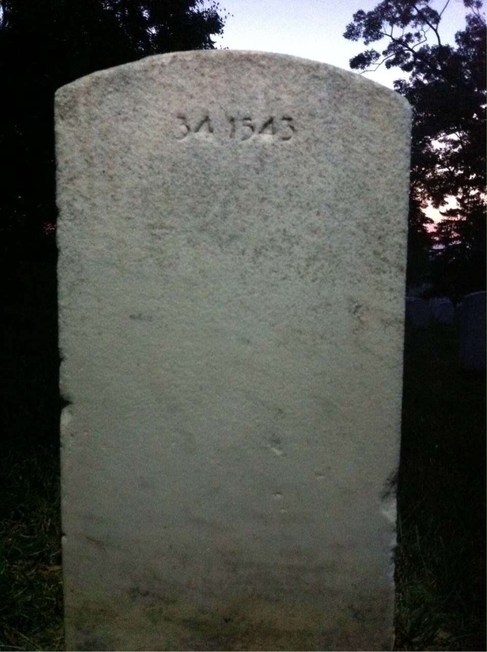Back of headstone — Claude Baker