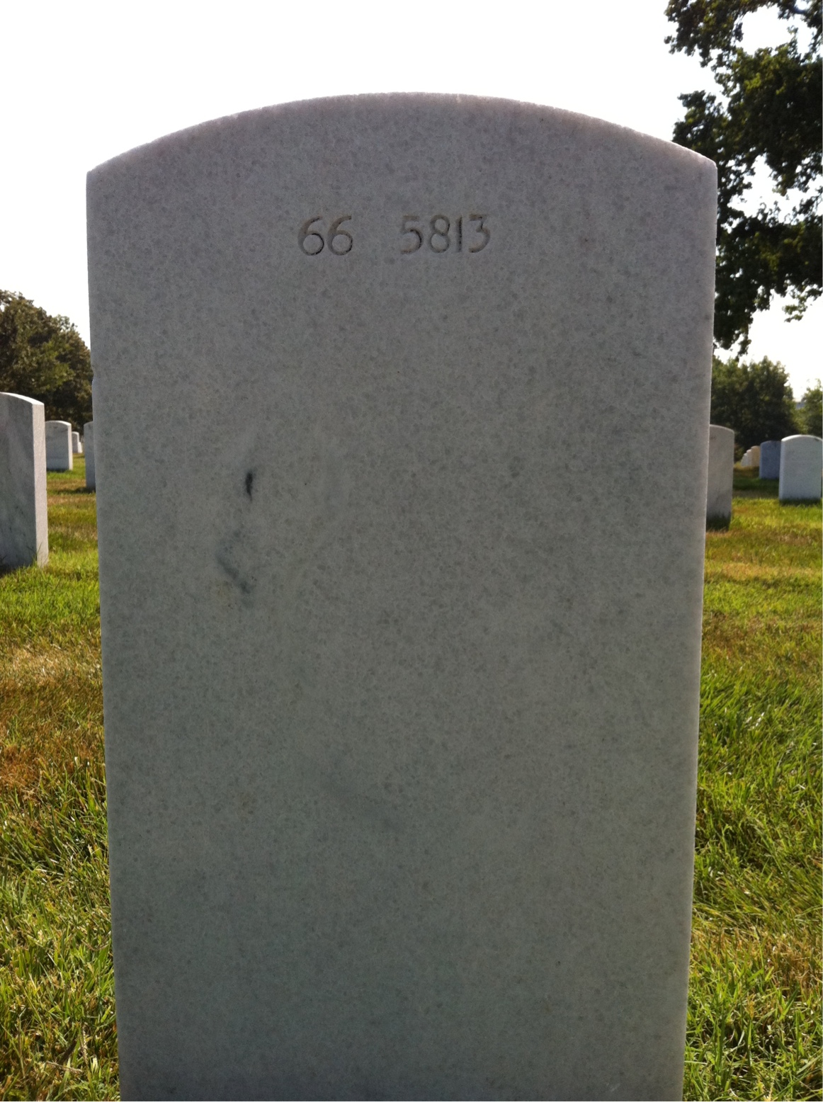 Back of headstone — Xavier E Scott