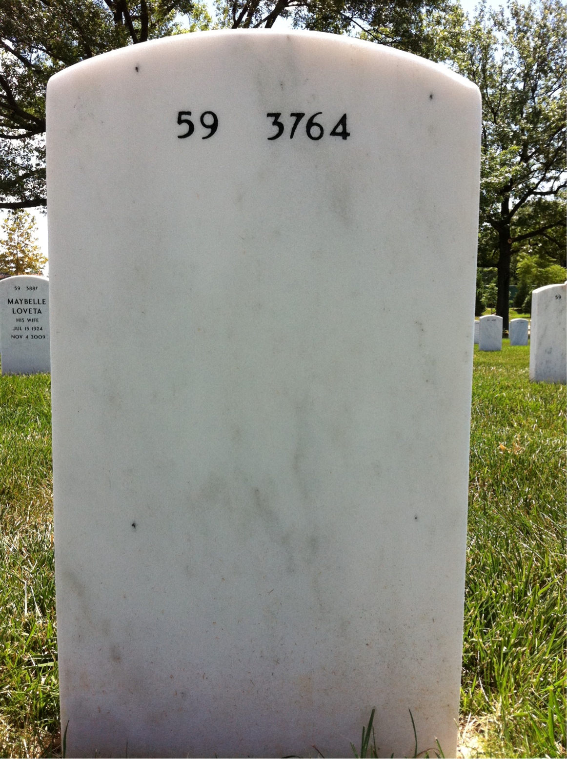 Back of headstone — Malcolm Wilkey