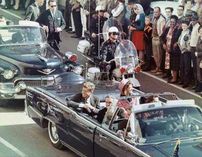 The Kennedys and the Connallys in the presidential limousine moments before the assassination in Dallas