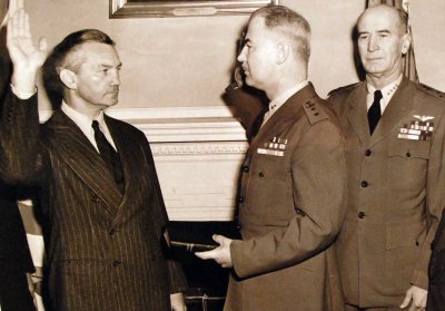 Forrestal takes the oath of office as Secretary of the Navy from Rear Admiral Thomas L. Gatch, judge advocate general of the Navy on May 19, 1944. Ernest King, Chief of Naval Operations, stands to the right.